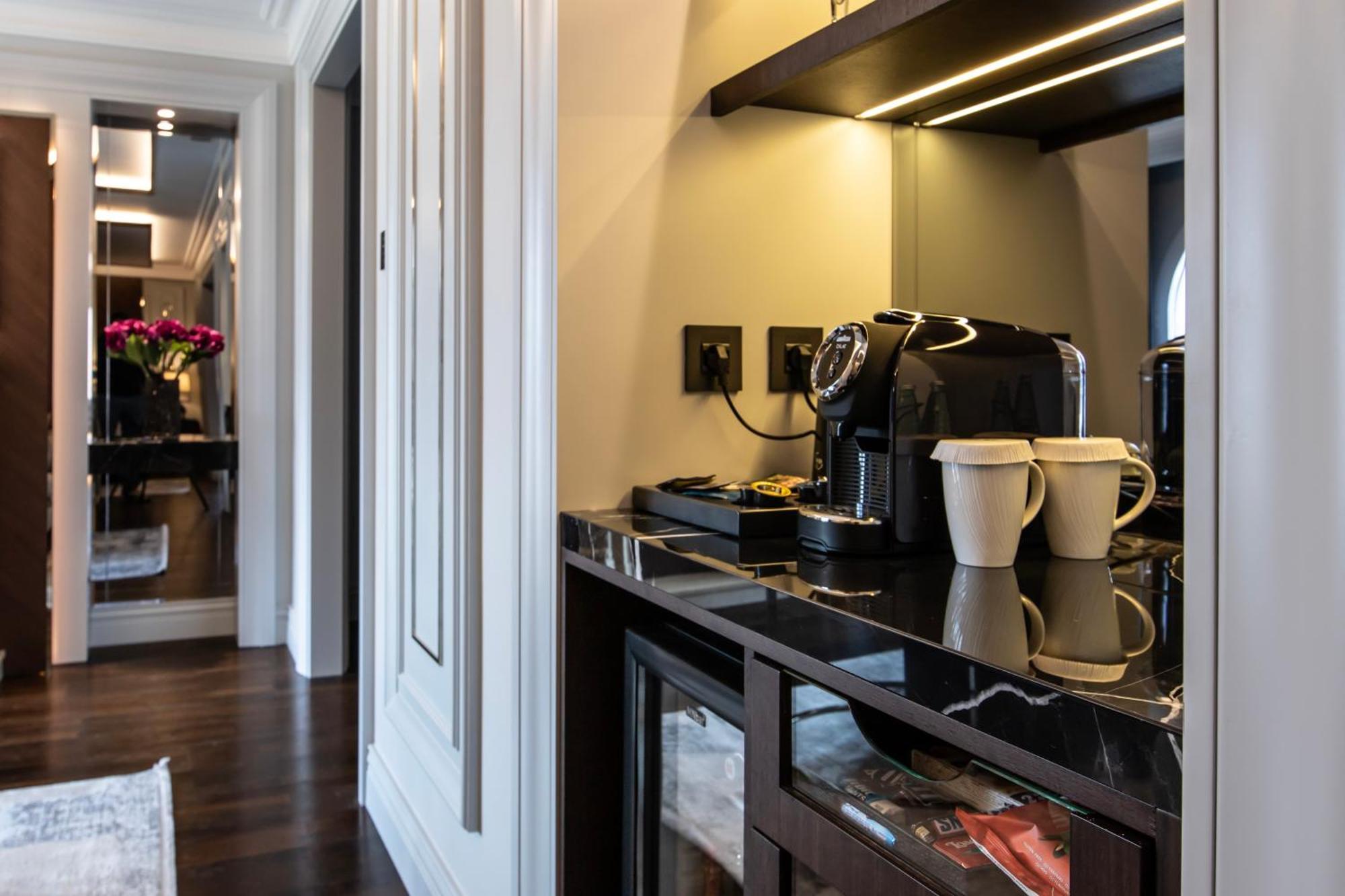 Xheko Imperial Luxury Hotel & Spa Tirana Exterior foto A Nespresso machine in a hotel room